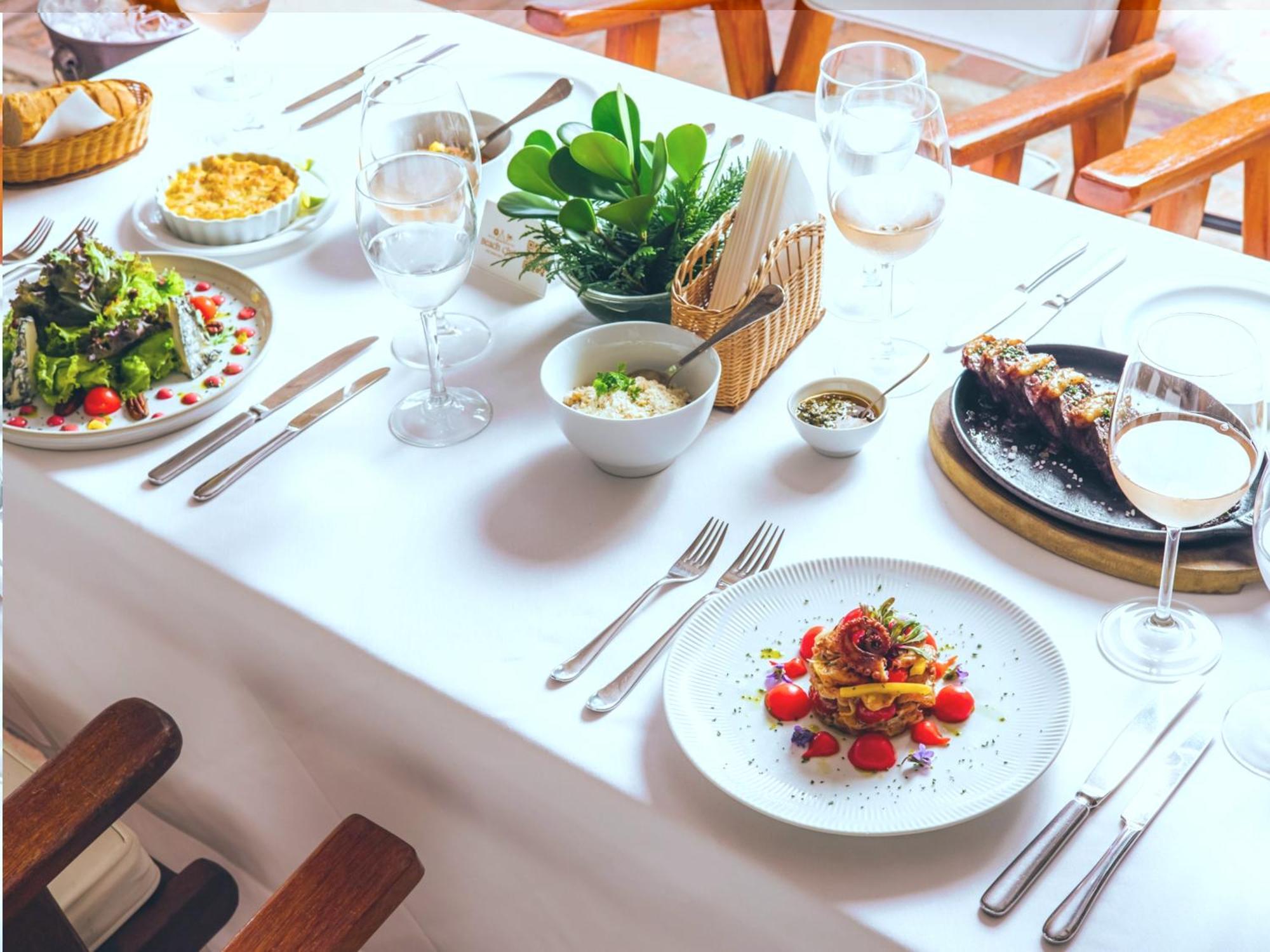Dpny Beach Hotel & Spa Ilhabela Esterno foto A table set for fine dining
